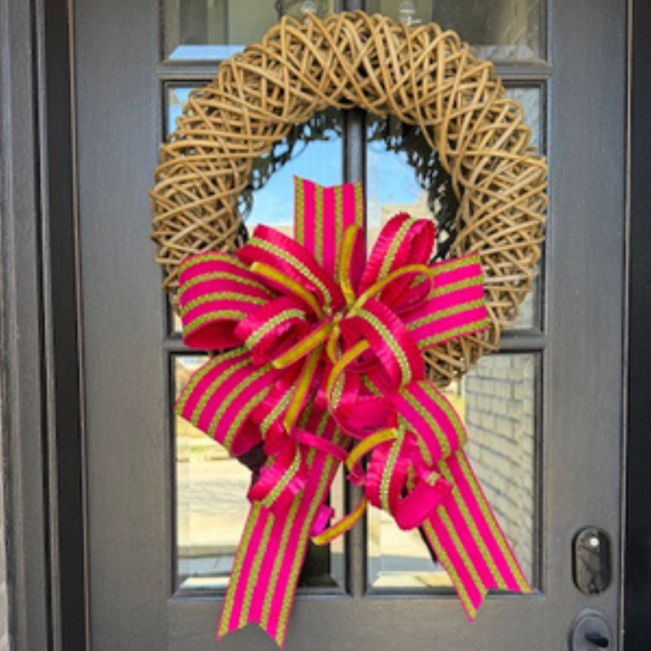 Rattan Wreath with Pink and Green Ribbons