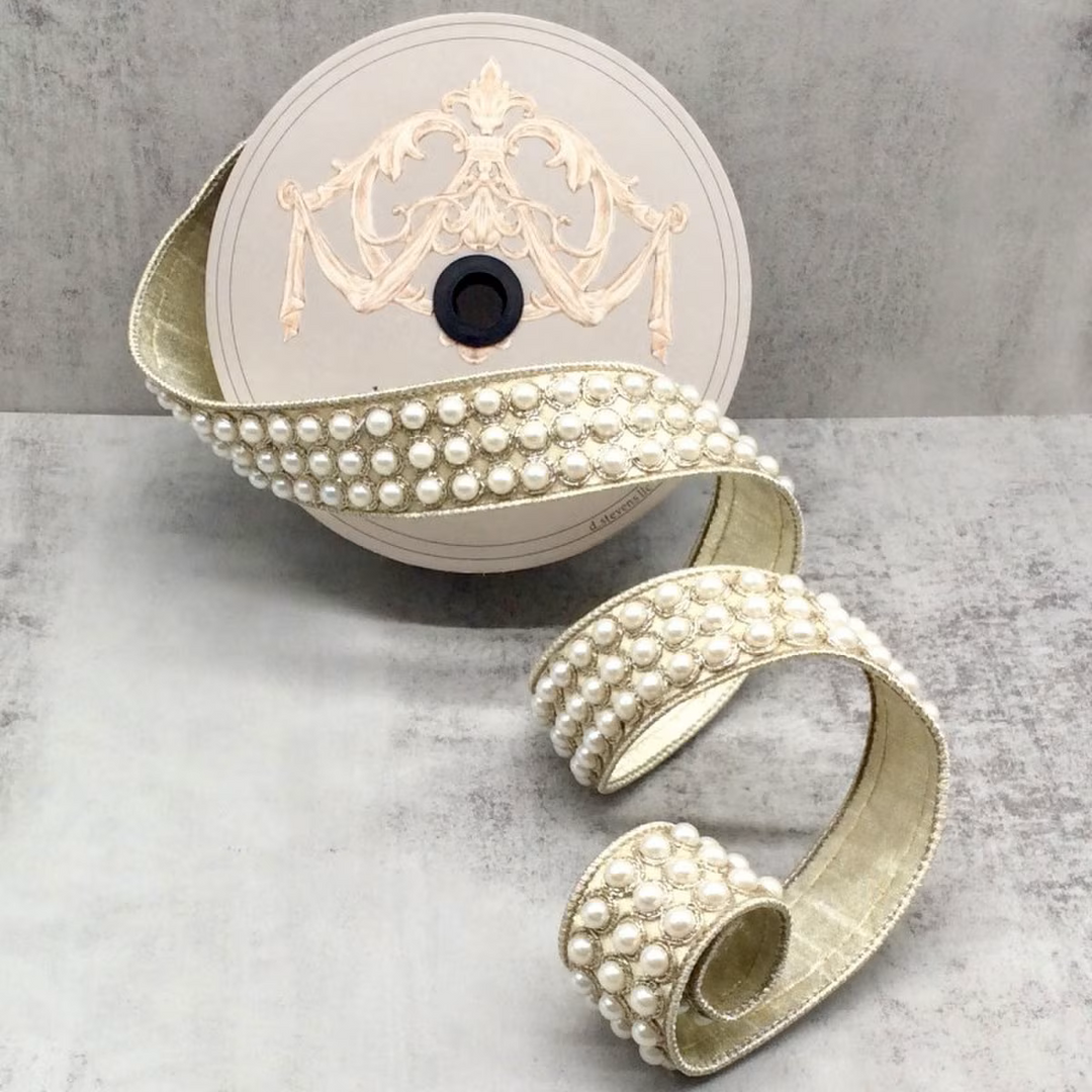 Shop d. Stevens 1.5" x 10 yard metallic platinum dupioni wired ribbon with elegant pearl trim. Perfect for wreaths, bows, Christmas décor, weddings, florals and luxury DIY projects.