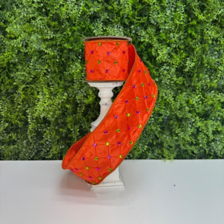 Farrisilk Jeweled orange wired ribbon with quilted texture and pink and green gem acccents. wired edge designer ribbon for Fall wreaths and Halloween decor.