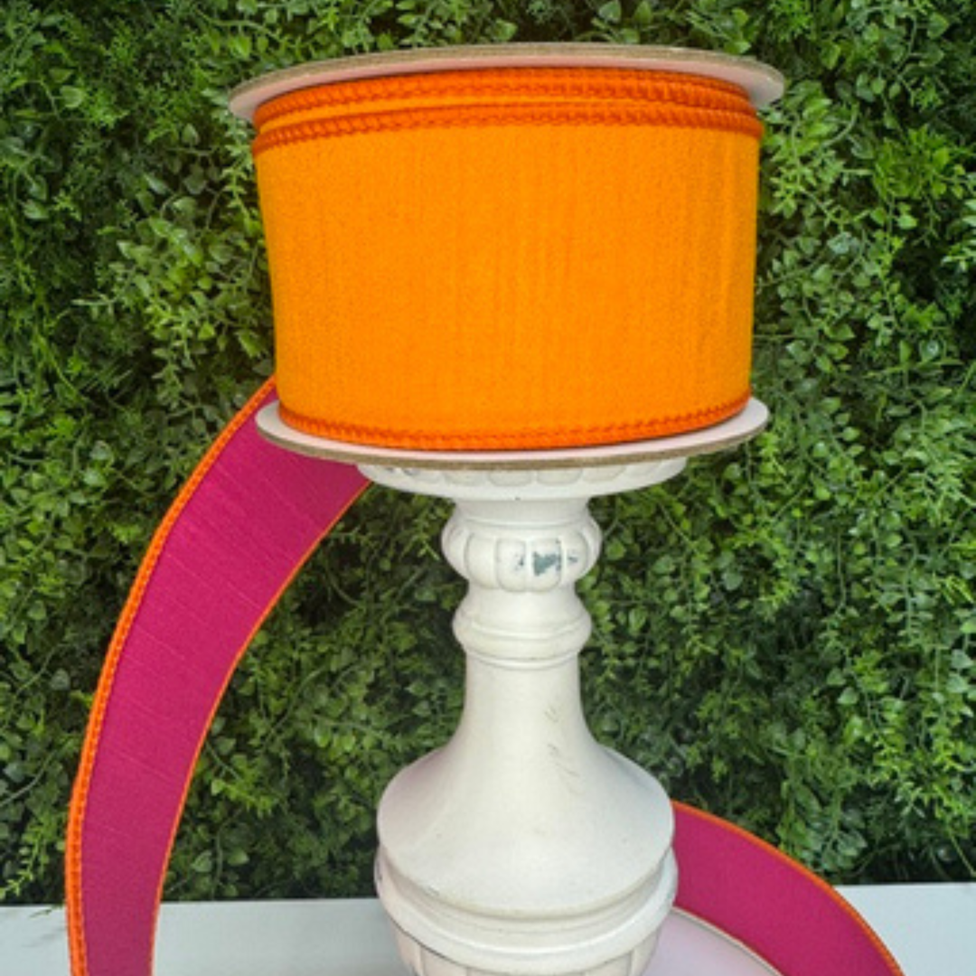 Farrisilk luxury two-tone dupioni wired ribbon in vibrant orange with hot pink reverse side, ideal for wreath bows, floral arrangements, and DIY decorating