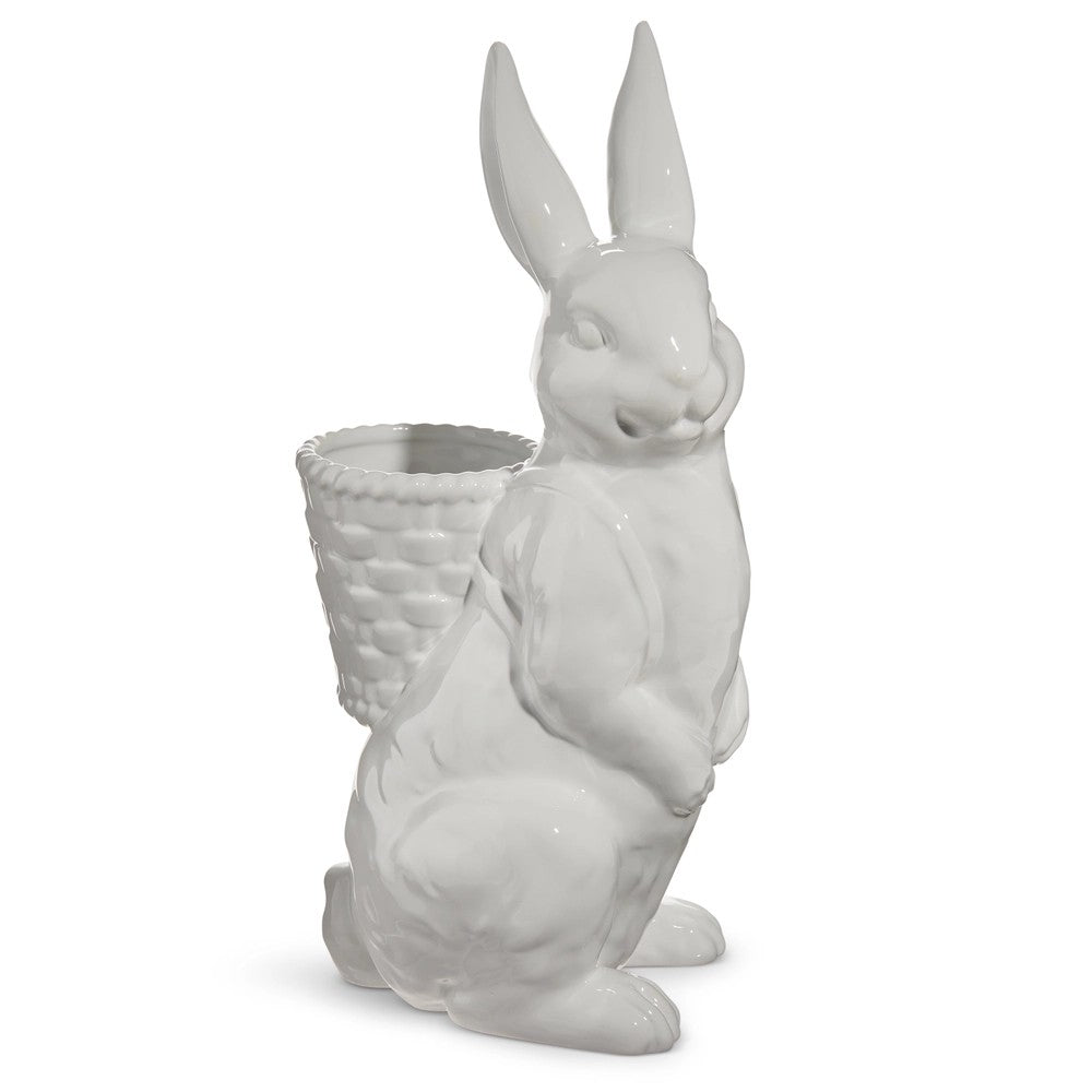 White ceramic rabbit-shaped planter with a basket on a white background