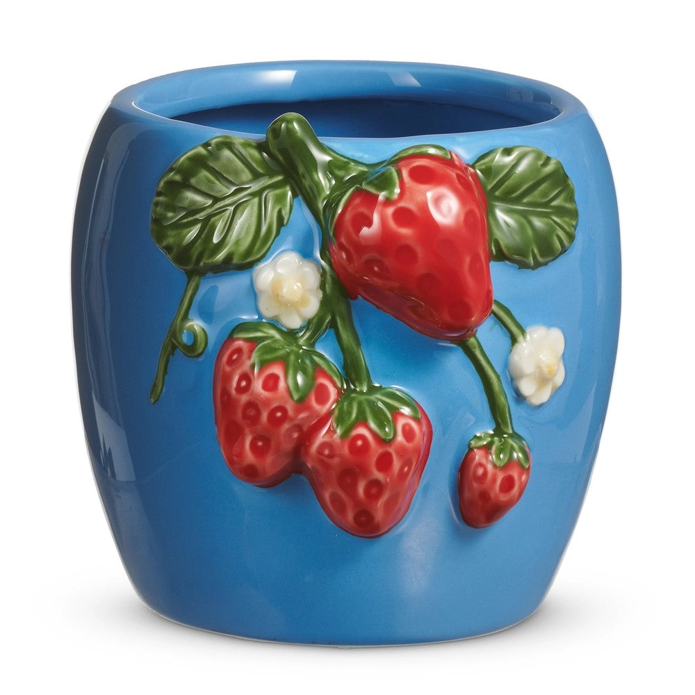 Blue ceramic pot with strawberry design on a white background