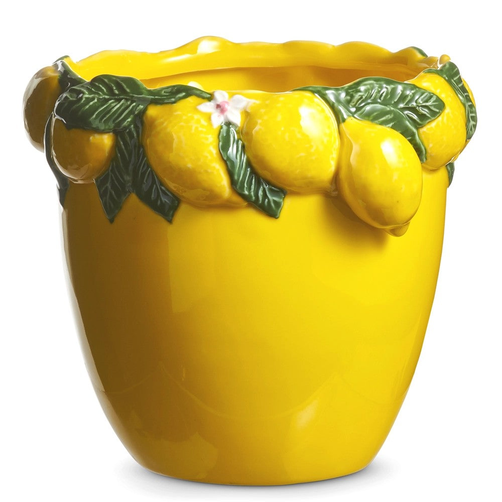 Yellow ceramic pot with lemon decorations on a white background