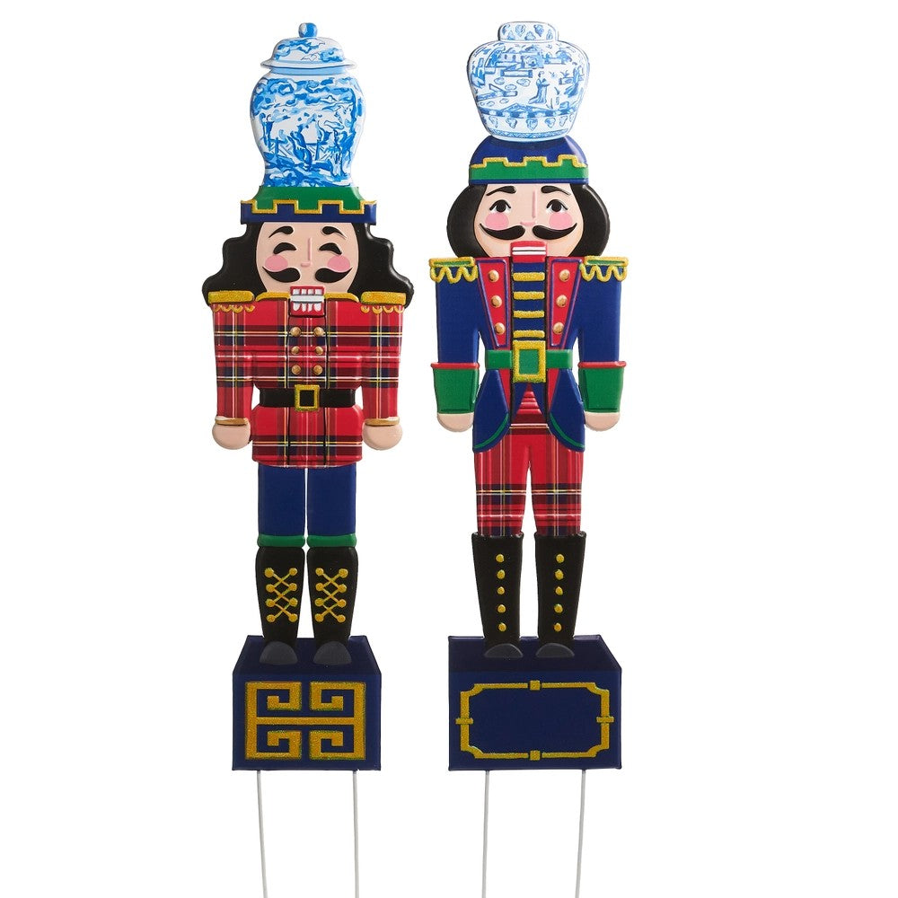 RAZ 44.5 inch Noble chinoiserie Nutcracker metal yard stake with blue and white ginger jar topper, available in two designs for indoor or outdoor Christmas decorating.