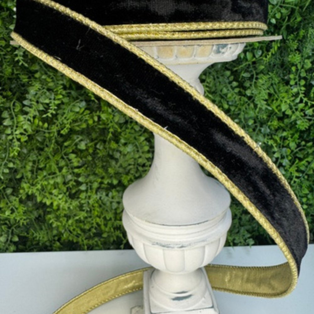 DC Exclusive Farrisilk black flashy velvet wired ribbon with gold backing, 1-inch designer ribbon for layered Christmas bows, wreaths, garlands, floral arrangements, gift wrapping, and luxury seasonal home décor. Close up of the ribbon