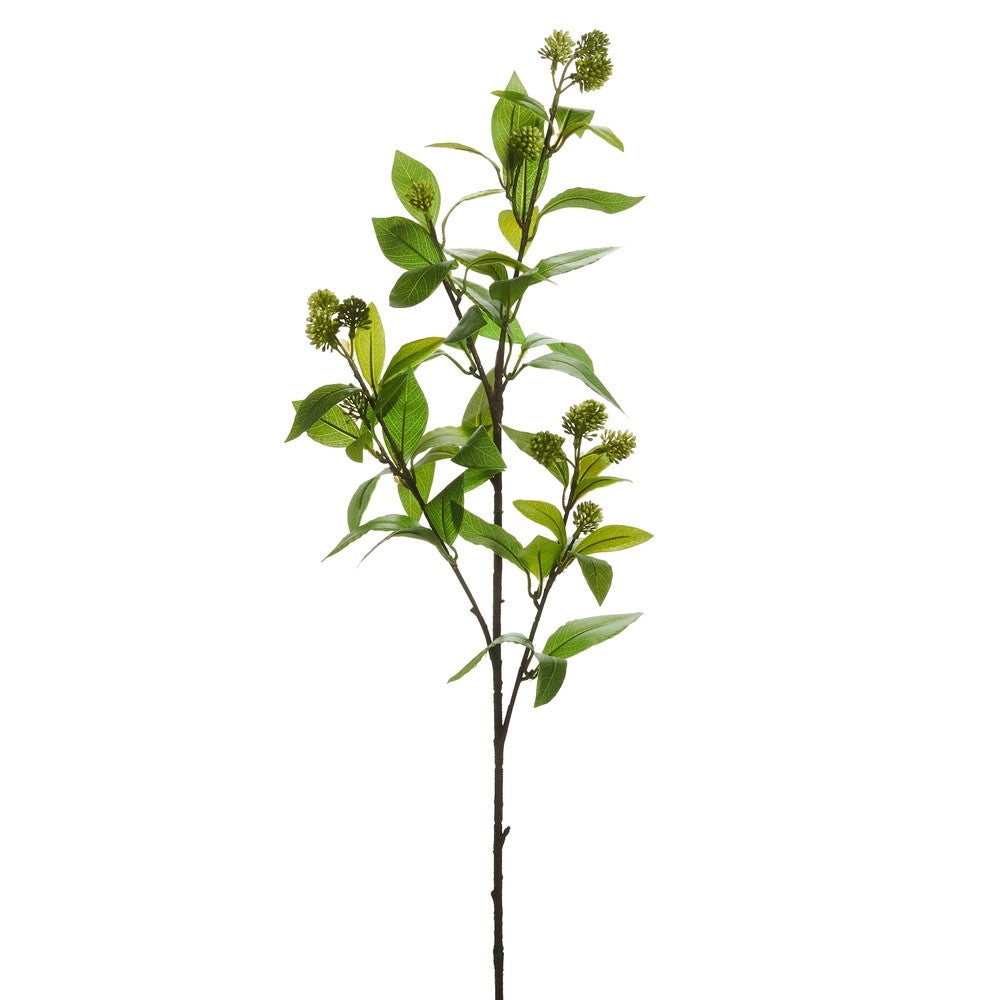 Artificial green leaf branch on a white background