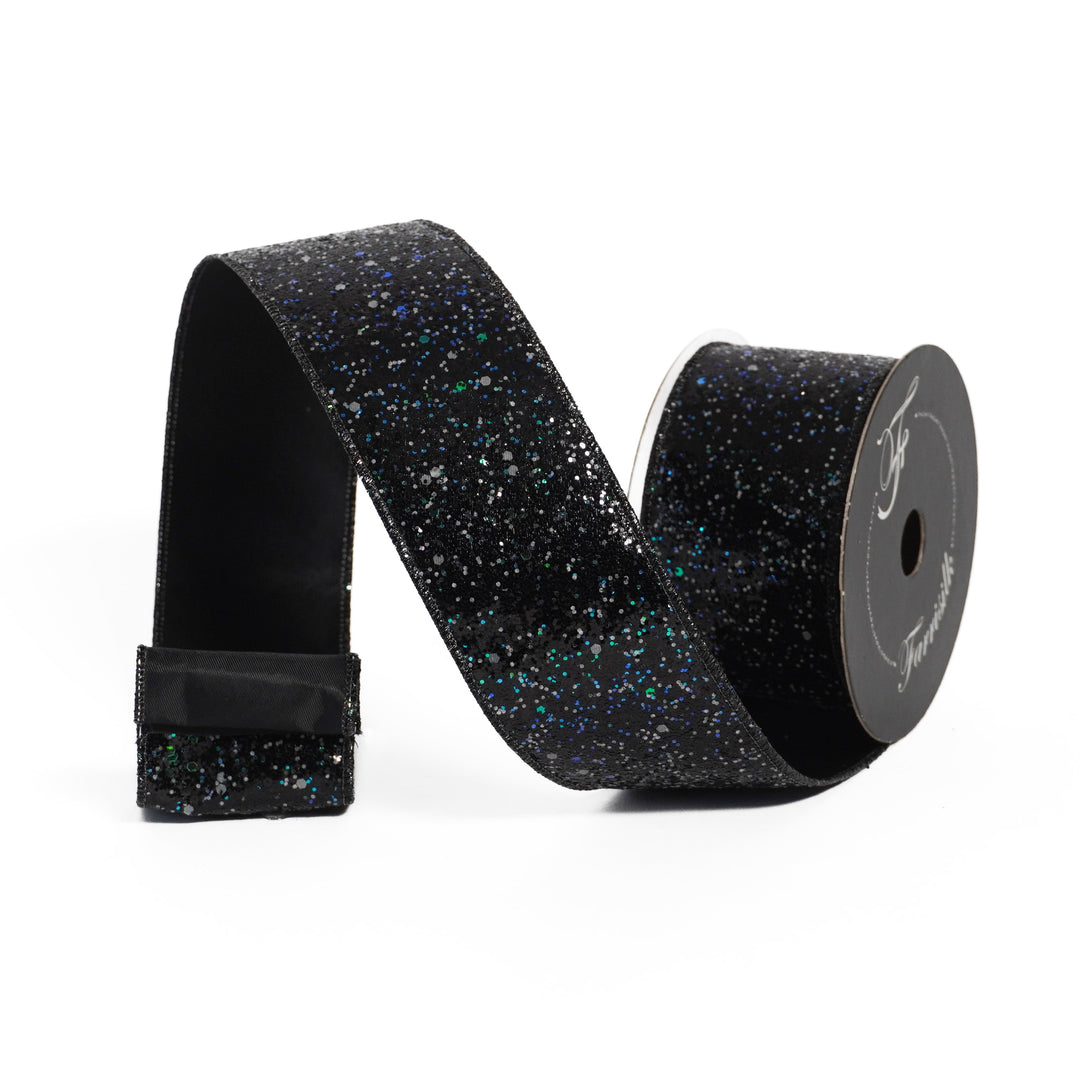 Black glitter ribbon spool on a white background
