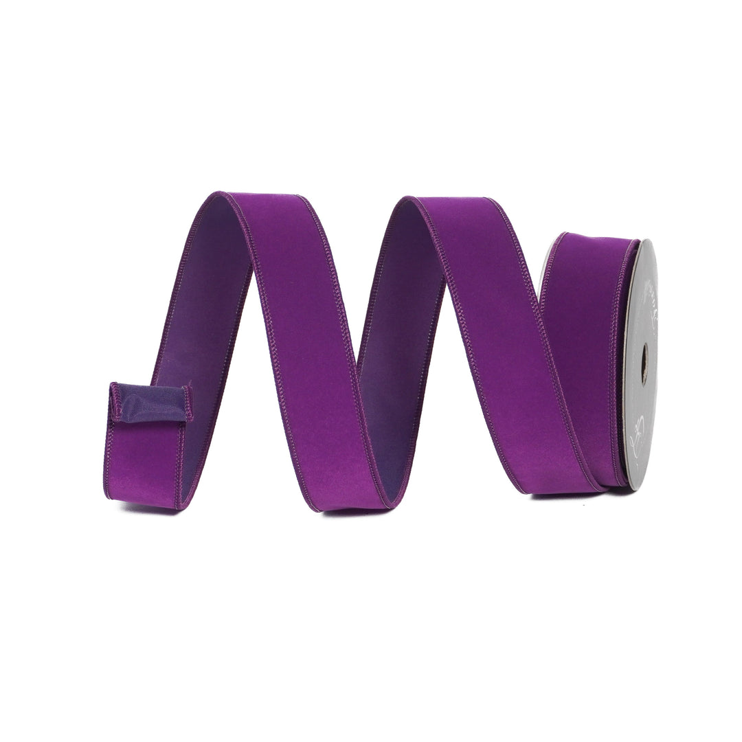 Purple ribbon on a white background