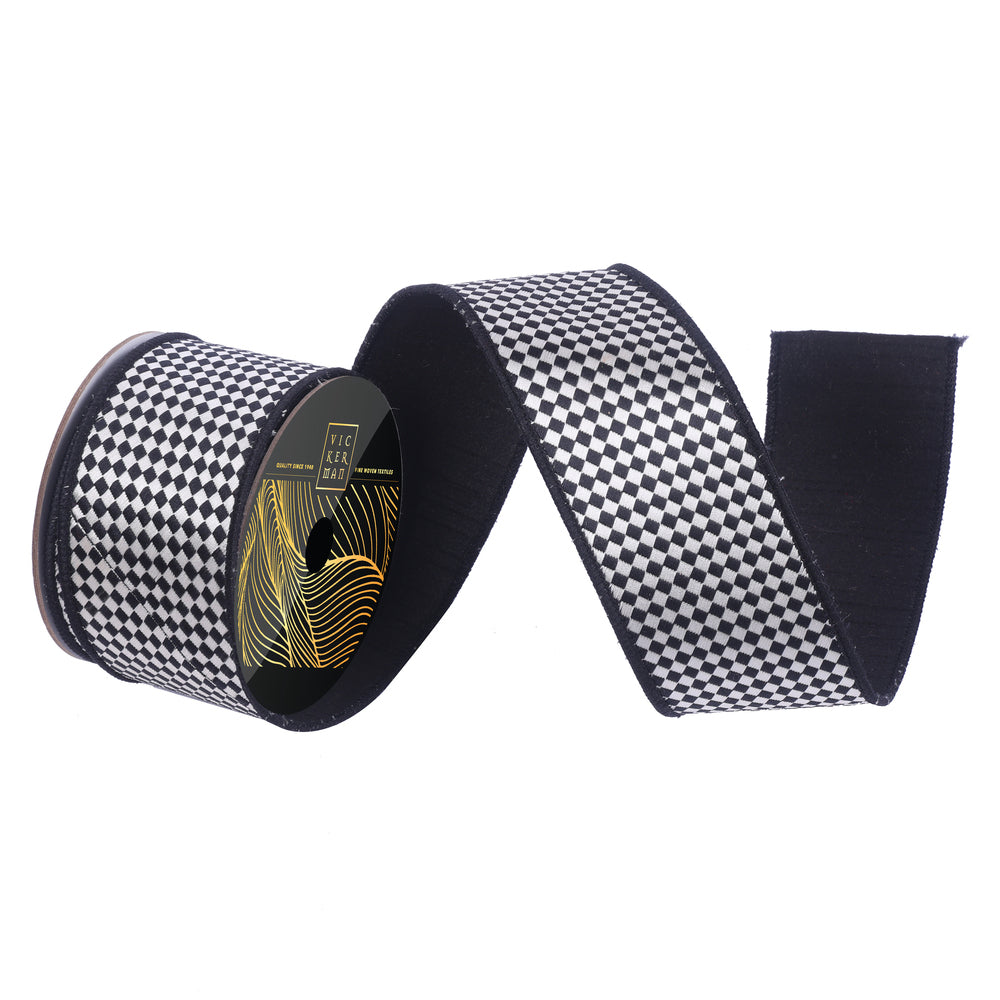Vickerman 2.5 inch black and white diamond check structured wired ribbon with black reverse for luxury bows, wreaths, Christmas trees, floral arrangements, Halloween décor, and everyday decorating.