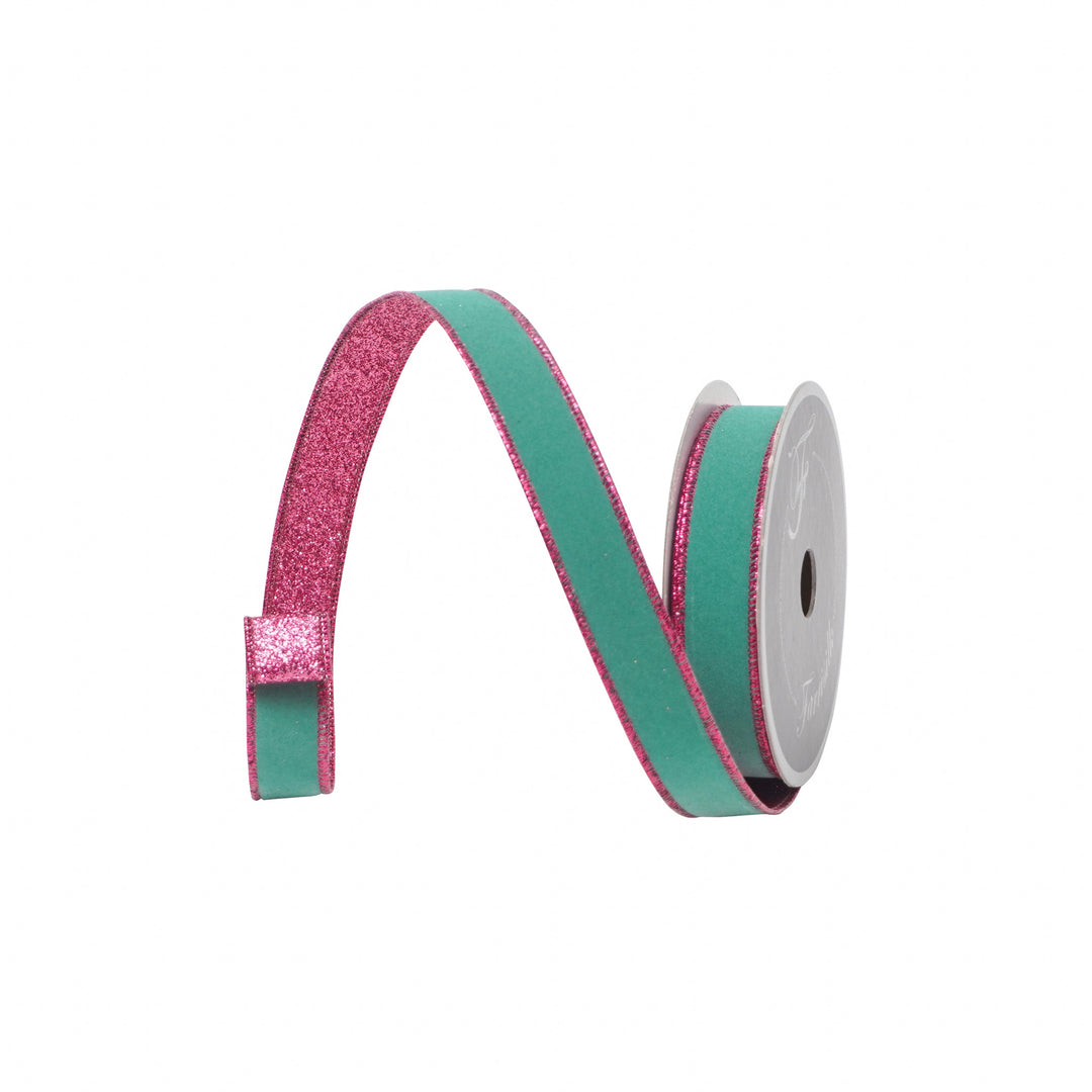 Teal and pink ribbon spool on a white background