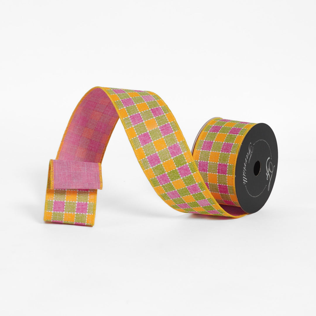 Checkered ribbon on a spool with a white background