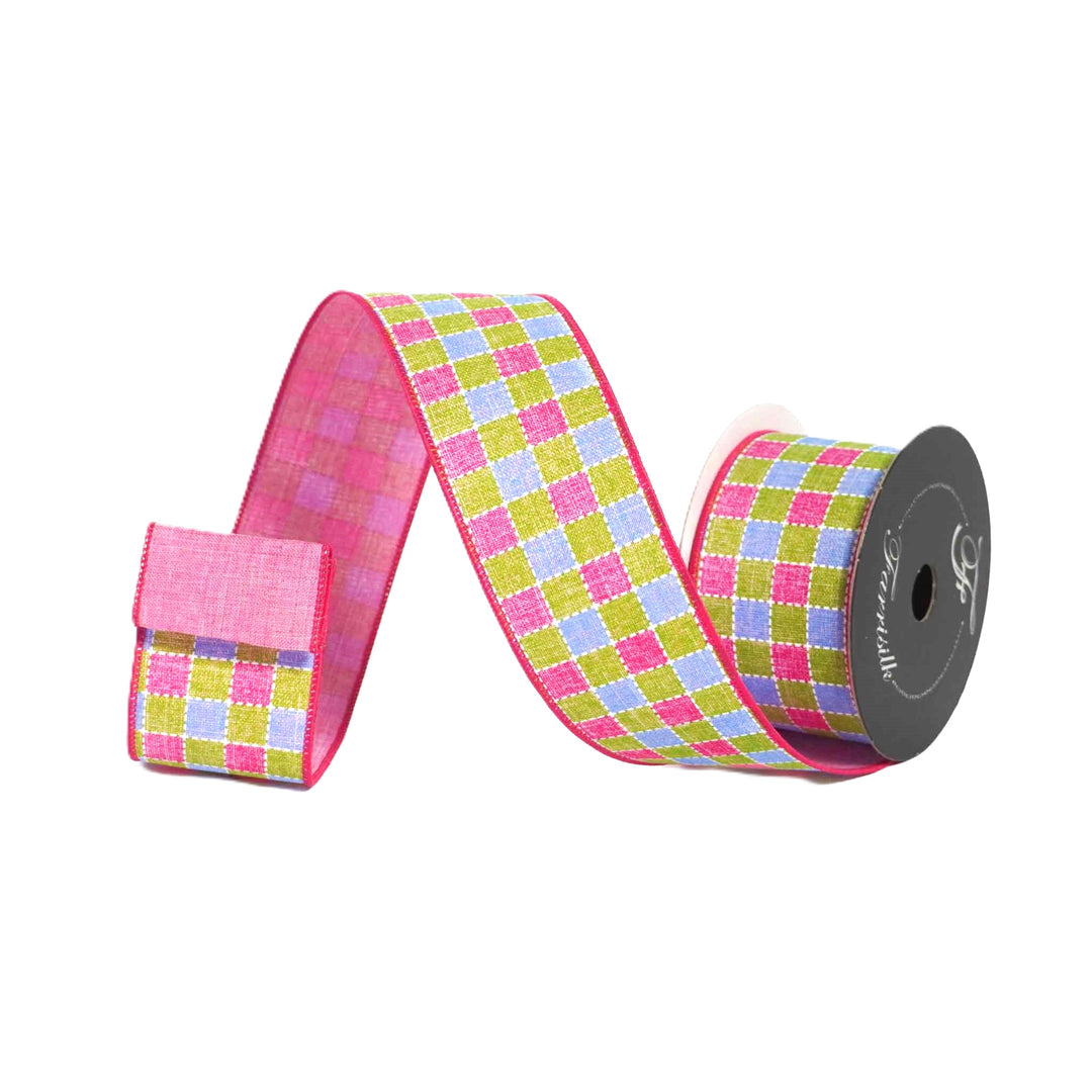 Checkered ribbon with pink, green, and purple pattern on a white background