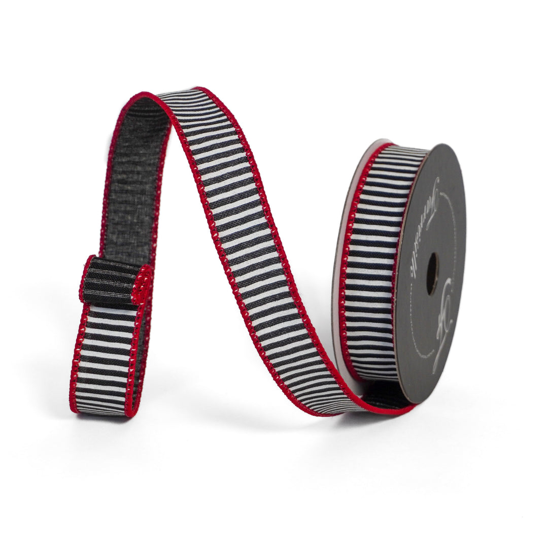 Striped ribbon with black, white, and red pattern on a white background