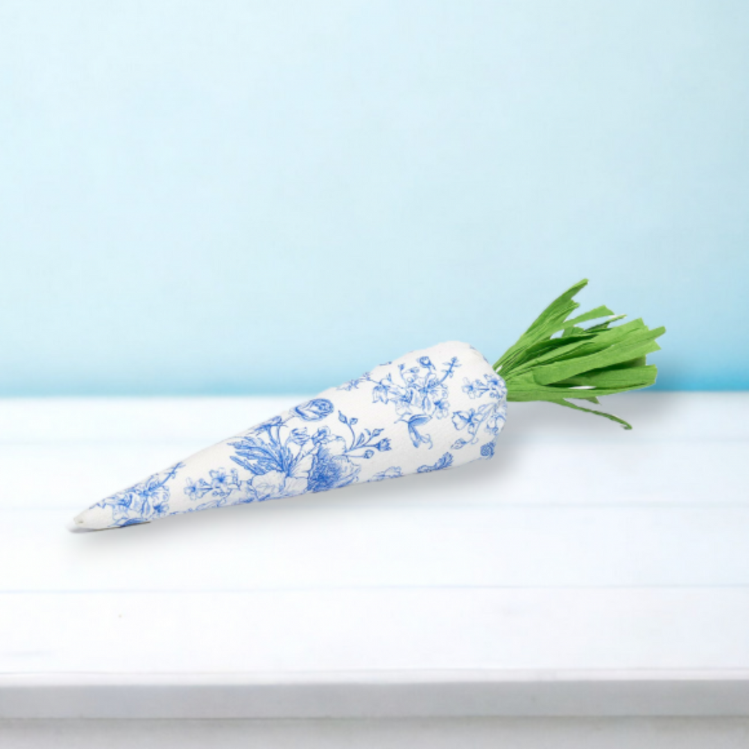 a photo of a blue and white fabric carrot
